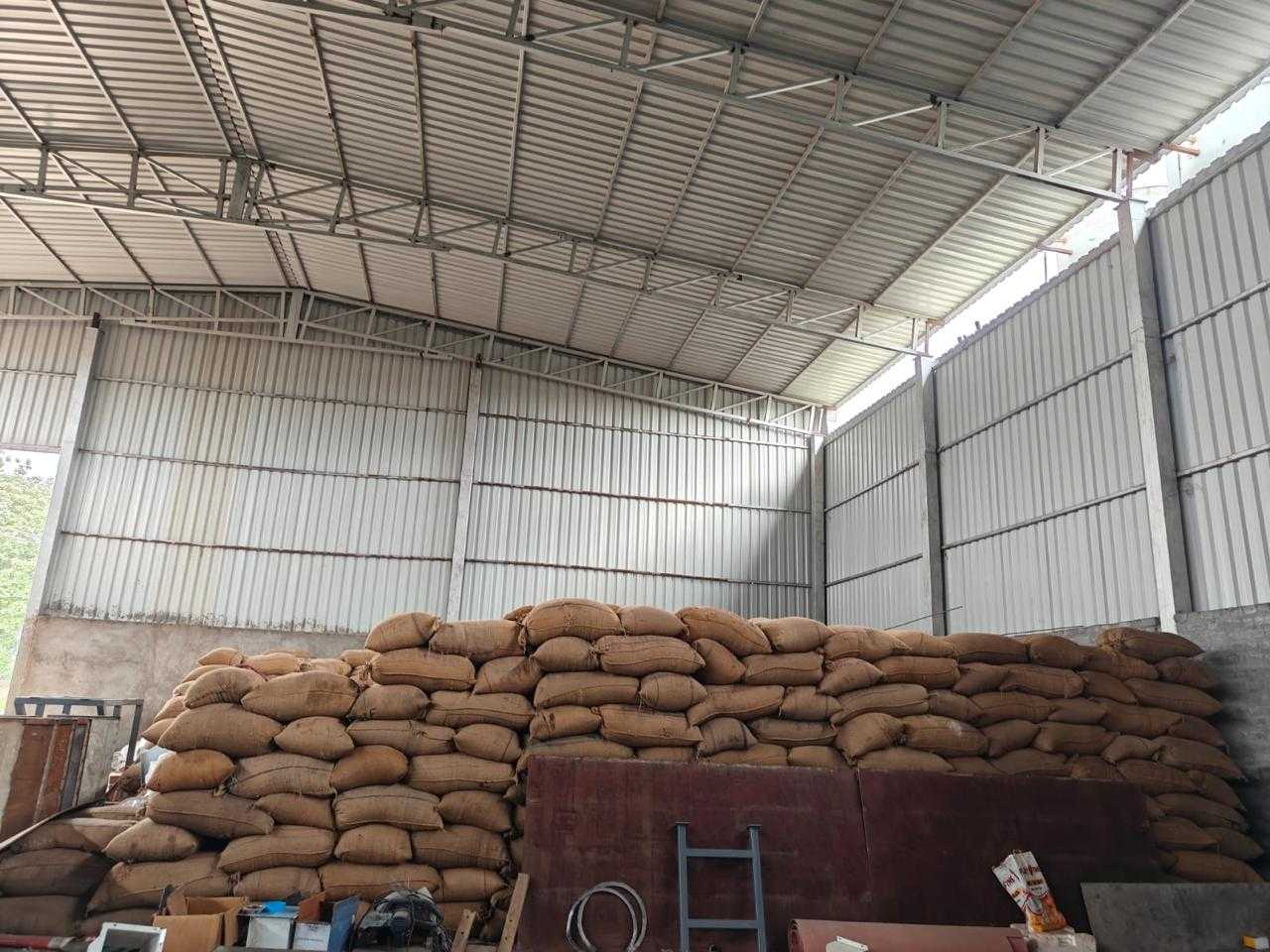 Kalahandi facility storage warehouse with stacked biomass bags