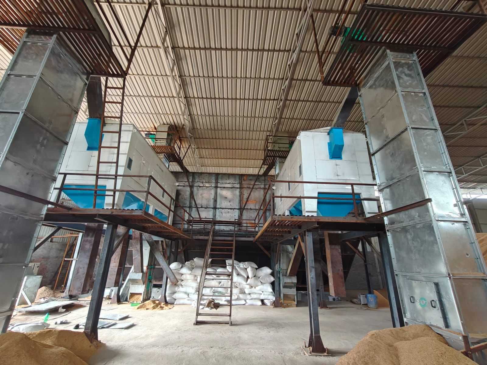Photograph from inside the LongStraw pyrolysis plant in Odisha showing cyclones and processing equipment